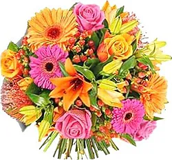 Ramo vibrante de rosas, lilium y gerberas, ideal para expresar amor y alegría.